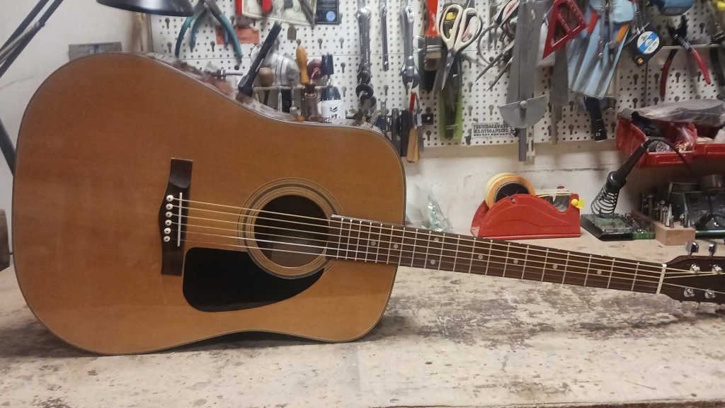 Fender acoustic guitar: bridge re-gluing - Roadrunner Guitars